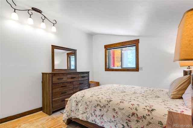 60 Jackson, Alma, CO 80420 - bedroom featuring lofted ceiling and light wood-style flooring