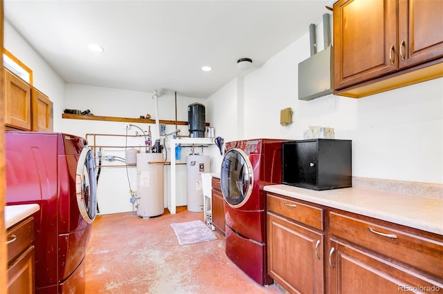 60 Jackson, Alma, CO 80420 - washroom featuring gas water heater, water heater, cabinet space, recessed lighting, and washing machine and dryer