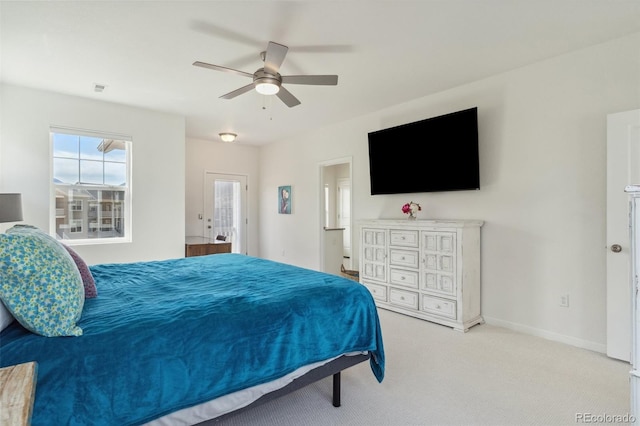 bedroom featuring ceiling fan, baseboards, and carpet floors