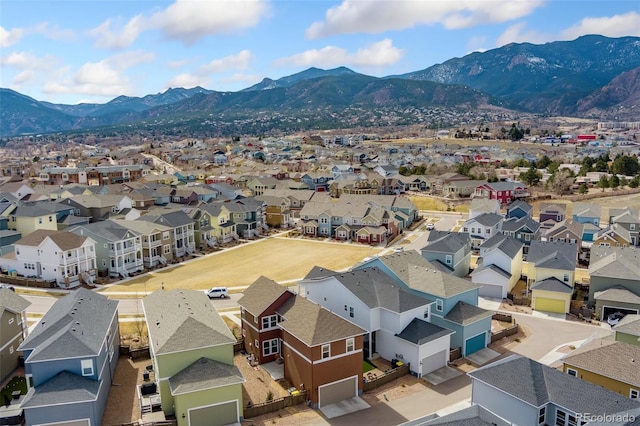 bird's eye view with a mountain view and a residential view