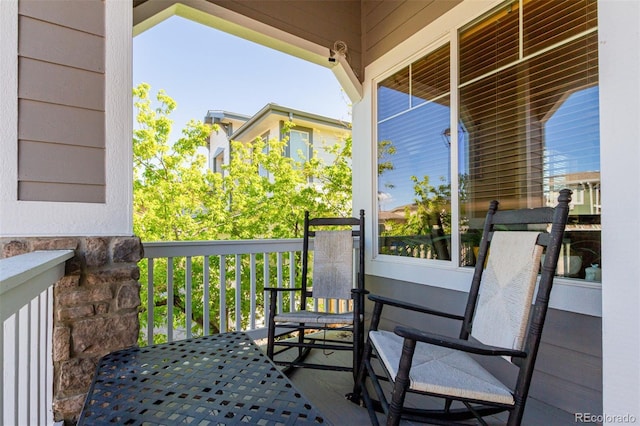 10554 Atwood Cir, Littleton, CO 80130 - balcony featuring covered porch