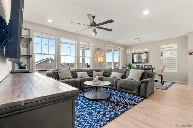 21426 E Stanford Ave, Aurora, CO 80015 - living area with ceiling fan, wood finished floors, and recessed lighting