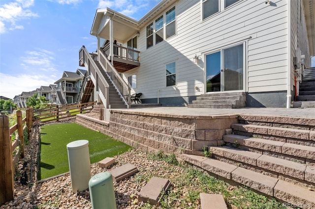 21426 E Stanford Ave, Aurora, CO 80015 - back of property featuring stairway, entry steps, and a patio