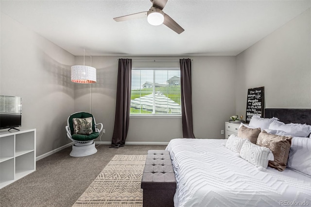 bedroom featuring ceiling fan and light carpet