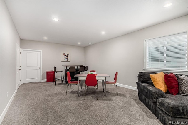 view of carpeted dining space