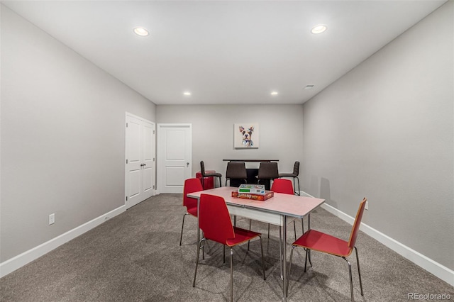 dining space featuring carpet floors