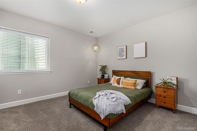 bedroom featuring carpet