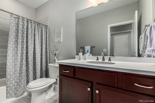 full bathroom with vanity, toilet, and shower / bathtub combination with curtain