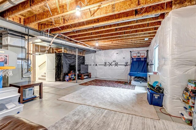 basement featuring stairway