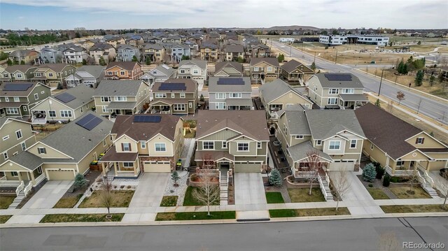 birds eye view of property with a residential view