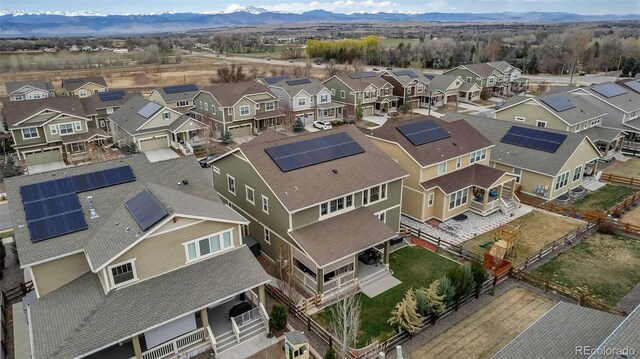 bird's eye view with a mountain view and a residential view