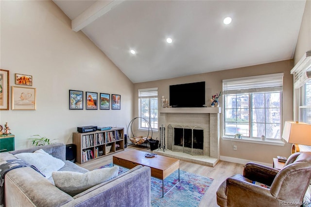 living room with high vaulted ceiling, baseboards, beam ceiling, a brick fireplace, and wood finished floors