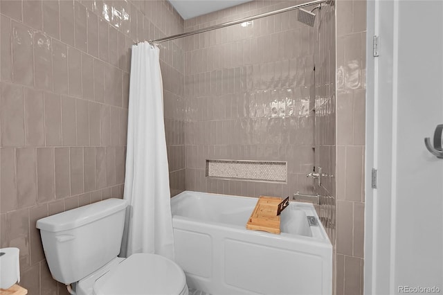 bathroom with tile walls, shower / bath combination with curtain, and toilet