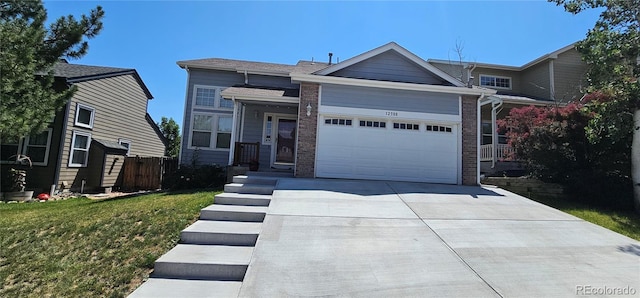 12388 Jasmine St, Brighton, CO 80602 - view of front of home featuring concrete driveway, a garage, and brick siding