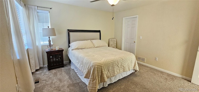 12388 Jasmine St, Brighton, CO 80602 - bedroom with carpet, multiple windows, and ceiling fan