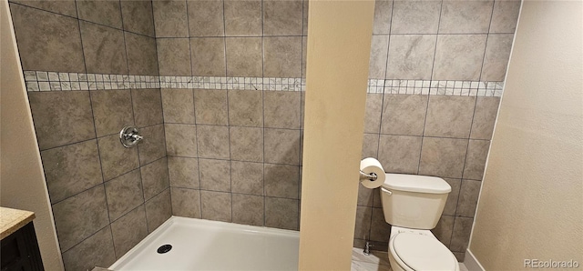 12388 Jasmine St, Brighton, CO 80602 - bathroom featuring a tile shower and vanity