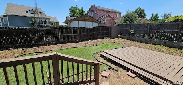 12388 Jasmine St, Brighton, CO 80602 - fenced backyard with a deck