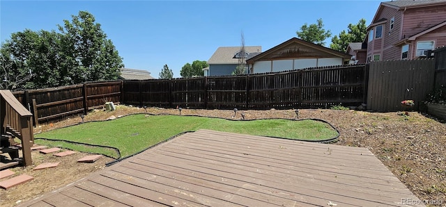 12388 Jasmine St, Brighton, CO 80602 - wooden terrace with a fenced backyard