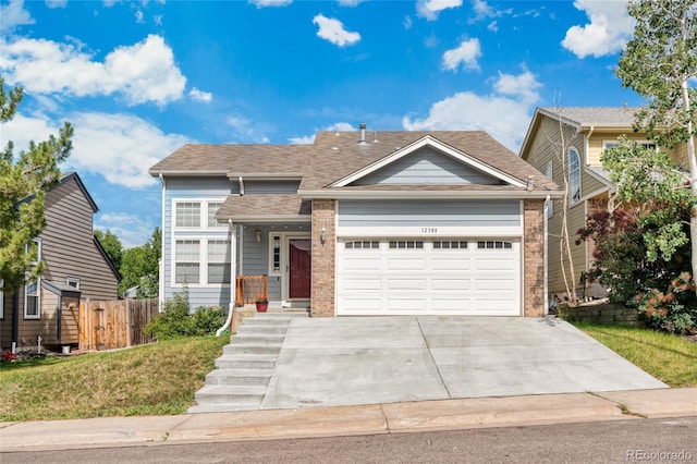12388 Jasmine St, Brighton, CO 80602 - traditional-style home featuring an attached garage, concrete driveway, roof with shingles, and brick siding