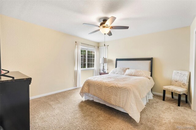 12388 Jasmine St, Brighton, CO 80602 - bedroom featuring light carpet and ceiling fan