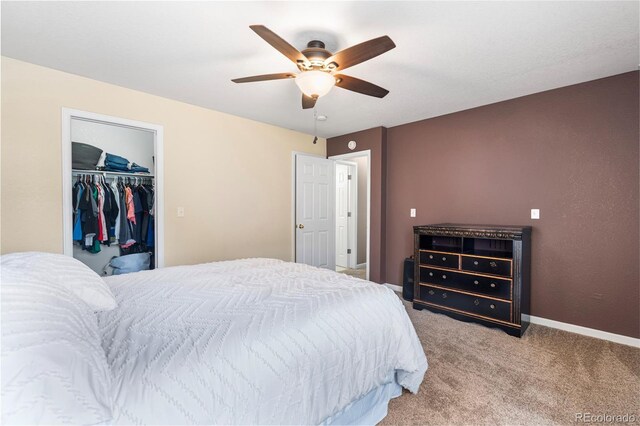 12388 Jasmine St, Brighton, CO 80602 - carpeted bedroom with ceiling fan and a walk in closet