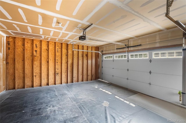 12388 Jasmine St, Brighton, CO 80602 - garage featuring a garage door opener