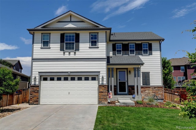4863 Wildflower Pl, Dacono, CO 80514 - craftsman house featuring stone siding, a garage, driveway, and a shingled roof