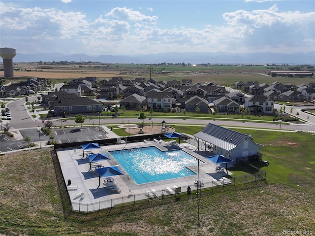 4863 Wildflower Pl, Dacono, CO 80514 - aerial perspective of suburban area with a pool
