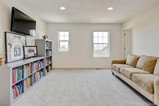 4863 Wildflower Pl, Dacono, CO 80514 - carpeted living area featuring recessed lighting