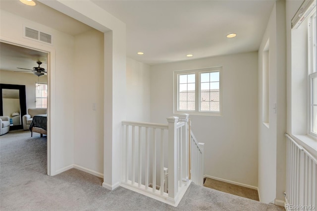 4863 Wildflower Pl, Dacono, CO 80514 - hall featuring an upstairs landing, carpet floors, healthy amount of natural light, and recessed lighting