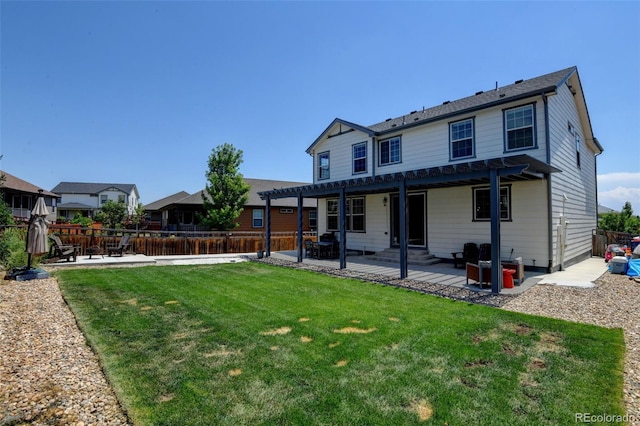 4863 Wildflower Pl, Dacono, CO 80514 - back of property with a pergola, a patio area, and a fenced backyard
