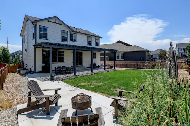 4863 Wildflower Pl, Dacono, CO 80514 - rear view of property with an outdoor fire pit, a pergola, a patio, and a fenced backyard