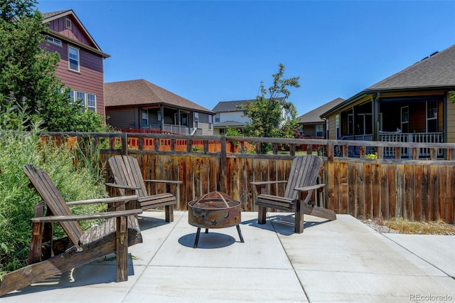 4863 Wildflower Pl, Dacono, CO 80514 - view of patio featuring an outdoor fire pit