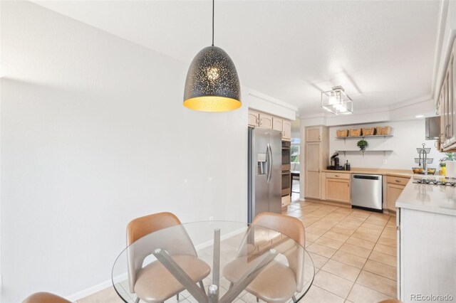 kitchen featuring stainless steel appliances, light countertops, light brown cabinets, light tile patterned floors, and open shelves