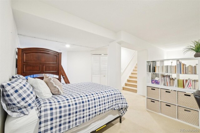 bedroom featuring carpet