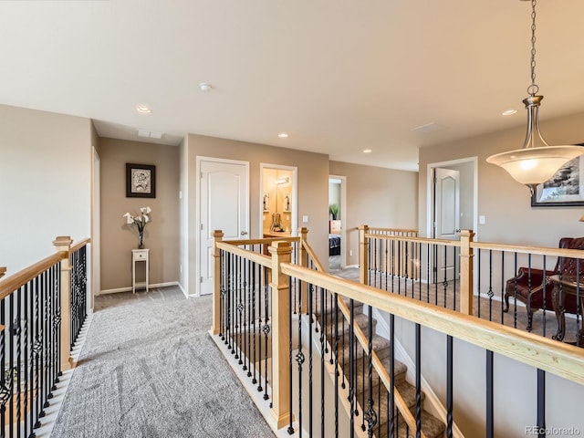 8522 S Dudley St, Littleton, CO 80128 - hall featuring an upstairs landing, carpet floors, and recessed lighting