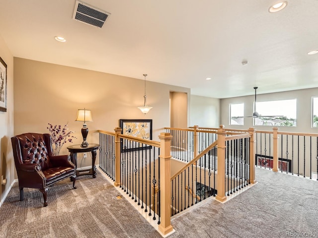 8522 S Dudley St, Littleton, CO 80128 - hall featuring carpet, an upstairs landing, and recessed lighting