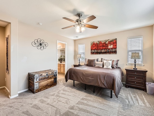 8522 S Dudley St, Littleton, CO 80128 - carpeted bedroom featuring ensuite bathroom and ceiling fan