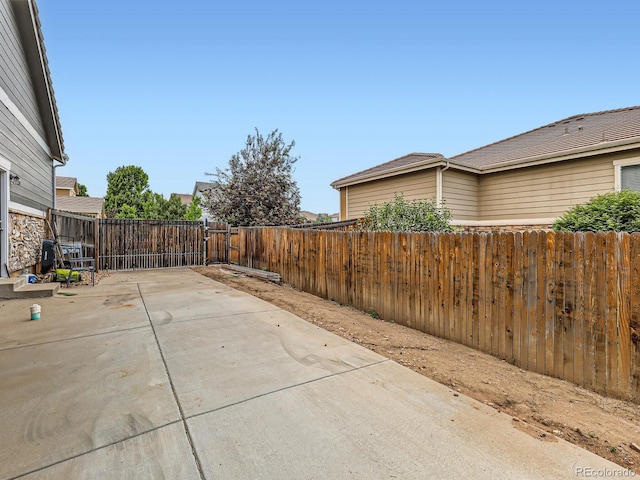 8522 S Dudley St, Littleton, CO 80128 - fenced backyard featuring a patio area