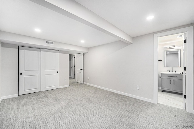 unfurnished bedroom with baseboards, recessed lighting, visible vents, and light colored carpet