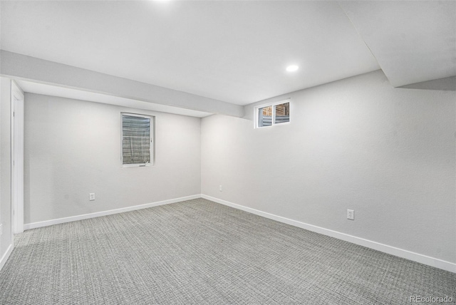 finished basement with carpet and baseboards