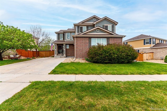 4873 S Fultondale Way, Aurora, CO 80016 - traditional-style home featuring brick siding and driveway