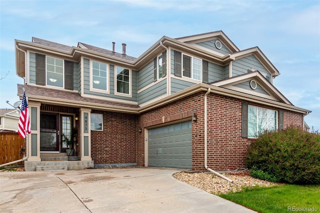 4873 S Fultondale Way, Aurora, CO 80016 - traditional-style home with driveway, brick siding, an attached garage, and fence