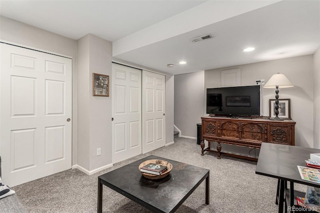 4873 S Fultondale Way, Aurora, CO 80016 - living area featuring light colored carpet, baseboards, and recessed lighting