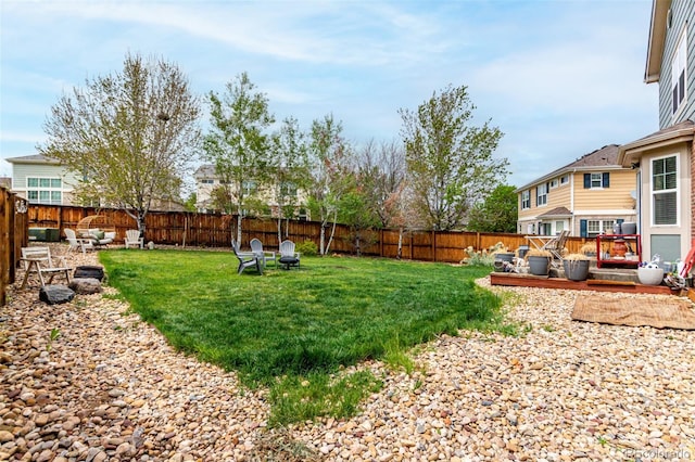 4873 S Fultondale Way, Aurora, CO 80016 - view of yard with an outdoor fire pit and a deck