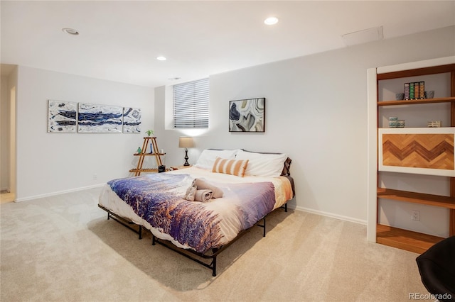 bedroom with light carpet