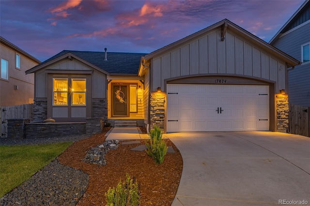 view of front of property with a garage