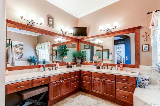 bathroom with vanity and crown molding