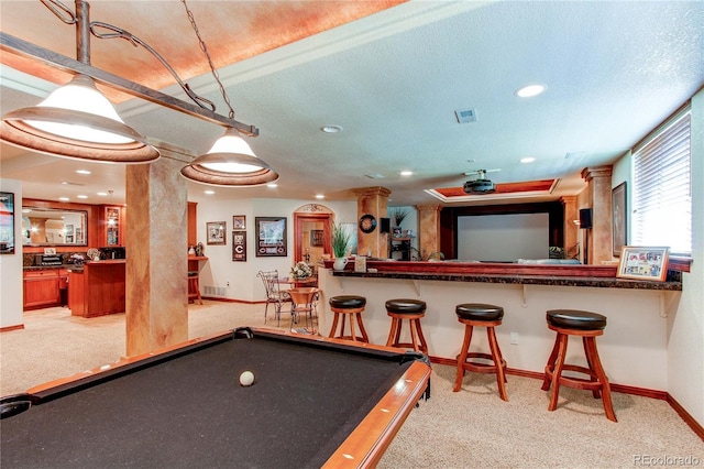 playroom with light colored carpet, bar, and pool table