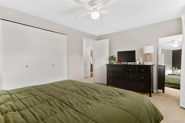 8485 W 44th Ave, Wheat Ridge, CO 80033 - bedroom with light carpet, a closet, and ceiling fan
